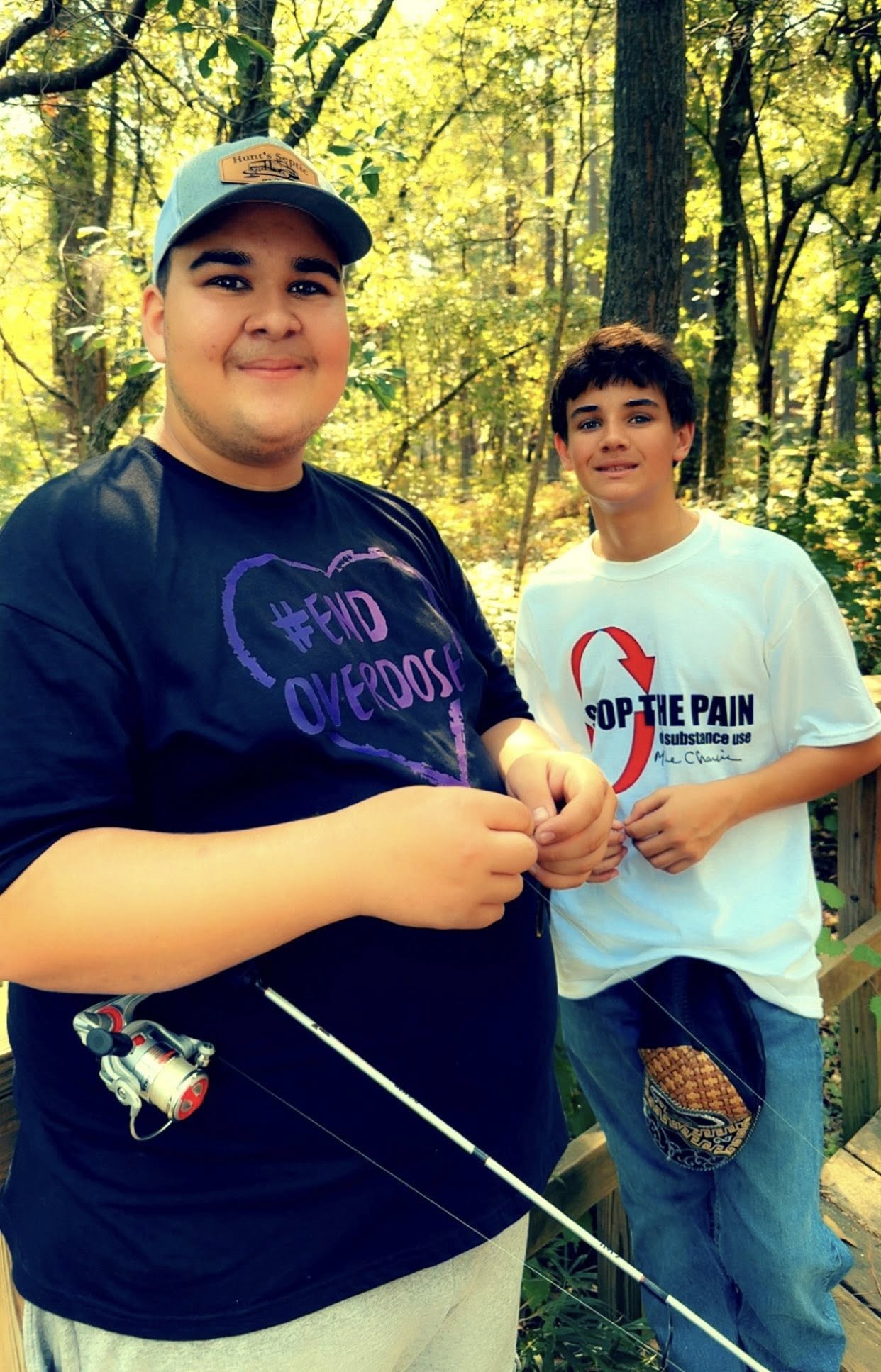 Youth fishing with End Overdose and Stop The Pain shirts